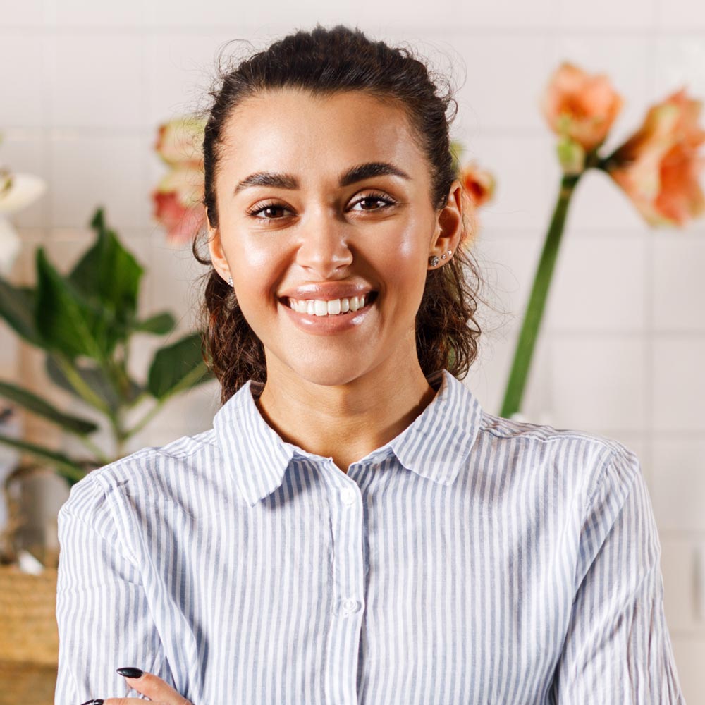 happy flower shop owner